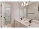 Double vanity bathroom with a shower/tub combo at 3640 Rolling Creek Dr, Buford, GA 30519