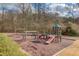 Community playground with swings, slides, and climbing structures at 3640 Rolling Creek Dr, Buford, GA 30519