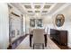 Formal dining room featuring a chandelier and hardwood floors at 4983 Kyle Dr, Powder Springs, GA 30127