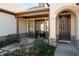 Welcoming front porch with stone flooring and double doors at 4983 Kyle Dr, Powder Springs, GA 30127