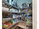 Well-organized pantry with ample shelving for food storage at 4983 Kyle Dr, Powder Springs, GA 30127