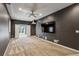 Finished basement with carpeting and large TV at 975 Seaboard Nw Ave, Atlanta, GA 30318