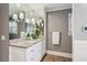 Bathroom with granite countertop and double sinks at 975 Seaboard Nw Ave, Atlanta, GA 30318