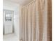 Simple bathroom with shower and linen cabinet at 975 Seaboard Nw Ave, Atlanta, GA 30318