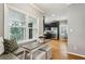 Built-in breakfast nook with window seat and rustic table at 975 Seaboard Nw Ave, Atlanta, GA 30318