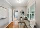 Hallway with built-in bench, window seat, and access to other rooms at 975 Seaboard Nw Ave, Atlanta, GA 30318