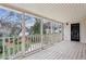 Screened porch with wood floors and backyard view at 975 Seaboard Nw Ave, Atlanta, GA 30318