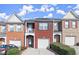 Brick townhome with 2-car garage and balcony at 2277 Hawks Bluff Trl, Lawrenceville, GA 30044