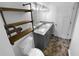 Modern bathroom with double vanity, granite countertop and decorative tile at 6049 Shallow Wood Ct, Douglasville, GA 30135