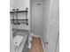 Small bathroom with vanity, granite countertop and toilet at 6049 Shallow Wood Ct, Douglasville, GA 30135