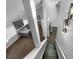 View of staircase overlooking kitchen and living areas at 6049 Shallow Wood Ct, Douglasville, GA 30135