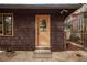 Back exterior of house with wooden siding and a door to the backyard at 1098 Jefferson Ave, East Point, GA 30344