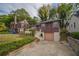 House exterior showcasing a shingled facade and landscaped yard at 1098 Jefferson Ave, East Point, GA 30344