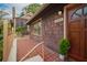 Inviting front porch with tile flooring and wooden railing at 1098 Jefferson Ave, East Point, GA 30344