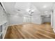 Large basement rec room with hardwood floors and built-ins at 127 Ennisbrook Se Dr, Smyrna, GA 30082