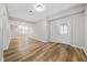 Bright basement entry with vinyl plank flooring and built-in shelving at 127 Ennisbrook Se Dr, Smyrna, GA 30082