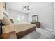 Serene bedroom with a ceiling fan and ample natural light at 127 Ennisbrook Se Dr, Smyrna, GA 30082