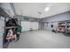 Organized garage with overhead storage and epoxy floor at 127 Ennisbrook Se Dr, Smyrna, GA 30082