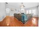 Spacious living room with hardwood floors and a cozy fireplace at 127 Ennisbrook Se Dr, Smyrna, GA 30082