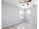 Bright bedroom with ceiling fan and neutral decor at 230 Ascott Ln, Woodstock, GA 30189