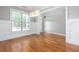 Dining room featuring hardwood floors and wainscoting at 230 Ascott Ln, Woodstock, GA 30189