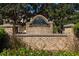 Community entrance with a brick sign reading 'Belmont Trace' at 230 Ascott Ln, Woodstock, GA 30189