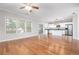 Gathering room with hardwood floors, fireplace, and sliding door at 230 Ascott Ln, Woodstock, GA 30189