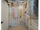 Unfinished basement with exposed utilities and concrete floor at 2716 Riggs Dr, East Point, GA 30344