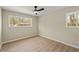 Spacious bedroom with wood floors and large windows at 2716 Riggs Dr, East Point, GA 30344