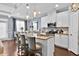 Modern kitchen with white cabinets, granite counters and stainless steel appliances at 2805 Ellis Pointe Ave, Conyers, GA 30094