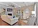 Living room with hardwood floors, fireplace and coffered ceilings at 2805 Ellis Pointe Ave, Conyers, GA 30094