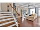 Spacious living room with hardwood floors and coffered ceilings at 2805 Ellis Pointe Ave, Conyers, GA 30094