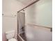 Bathroom with shower/tub combo and gray tile at 1803 Ashborough Way # Apt F, Marietta, GA 30067
