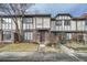 Brick townhouse exterior with landscaping and walkway at 1803 Ashborough Way # Apt F, Marietta, GA 30067
