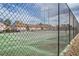 Community tennis court with chain link fence at 1803 Ashborough Way # Apt F, Marietta, GA 30067