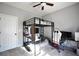 Bedroom featuring a bunk bed, workspace, and ample natural light at 123 Hollow Springs Dr, Hiram, GA 30141