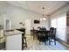 Dining area with hardwood floors and large windows at 123 Hollow Springs Dr, Hiram, GA 30141