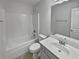 Simple bathroom with a single vanity and shower/tub combo at 1710 Garbrooke Cv, Lawrenceville, GA 30046