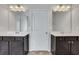 Double vanity bathroom with dark brown cabinets at 204 Hickory Commons Way, Canton, GA 30115