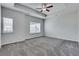 Primary bedroom with gray carpet and large window at 204 Hickory Commons Way, Canton, GA 30115