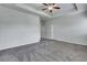 Large bedroom with gray carpet and ceiling fan at 204 Hickory Commons Way, Canton, GA 30115