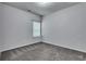 Bright bedroom with gray carpet and a window with blinds at 204 Hickory Commons Way, Canton, GA 30115