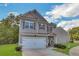 Two-story house with garage at 204 Hickory Commons Way, Canton, GA 30115