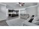 Open living room with dark kitchen cabinets and granite countertops visible at 204 Hickory Commons Way, Canton, GA 30115