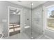 Spa-like bathroom with a walk-in shower and marble tile at 3170 Old Hwy 92 Dr, Acworth, GA 30102