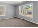 Bright bedroom with large windows and neutral carpeting at 3170 Old Hwy 92 Dr, Acworth, GA 30102