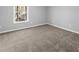 Simple bedroom with neutral walls and carpeted floor at 3170 Old Hwy 92 Dr, Acworth, GA 30102