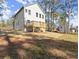 Two story house with wooden deck and backyard at 3170 Old Hwy 92 Dr, Acworth, GA 30102