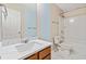 Bathroom with vanity, toilet, and bathtub at 6397 Barker Station Walk, Sugar Hill, GA 30518