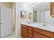 Bathroom boasts double vanity and a shower at 6397 Barker Station Walk, Sugar Hill, GA 30518